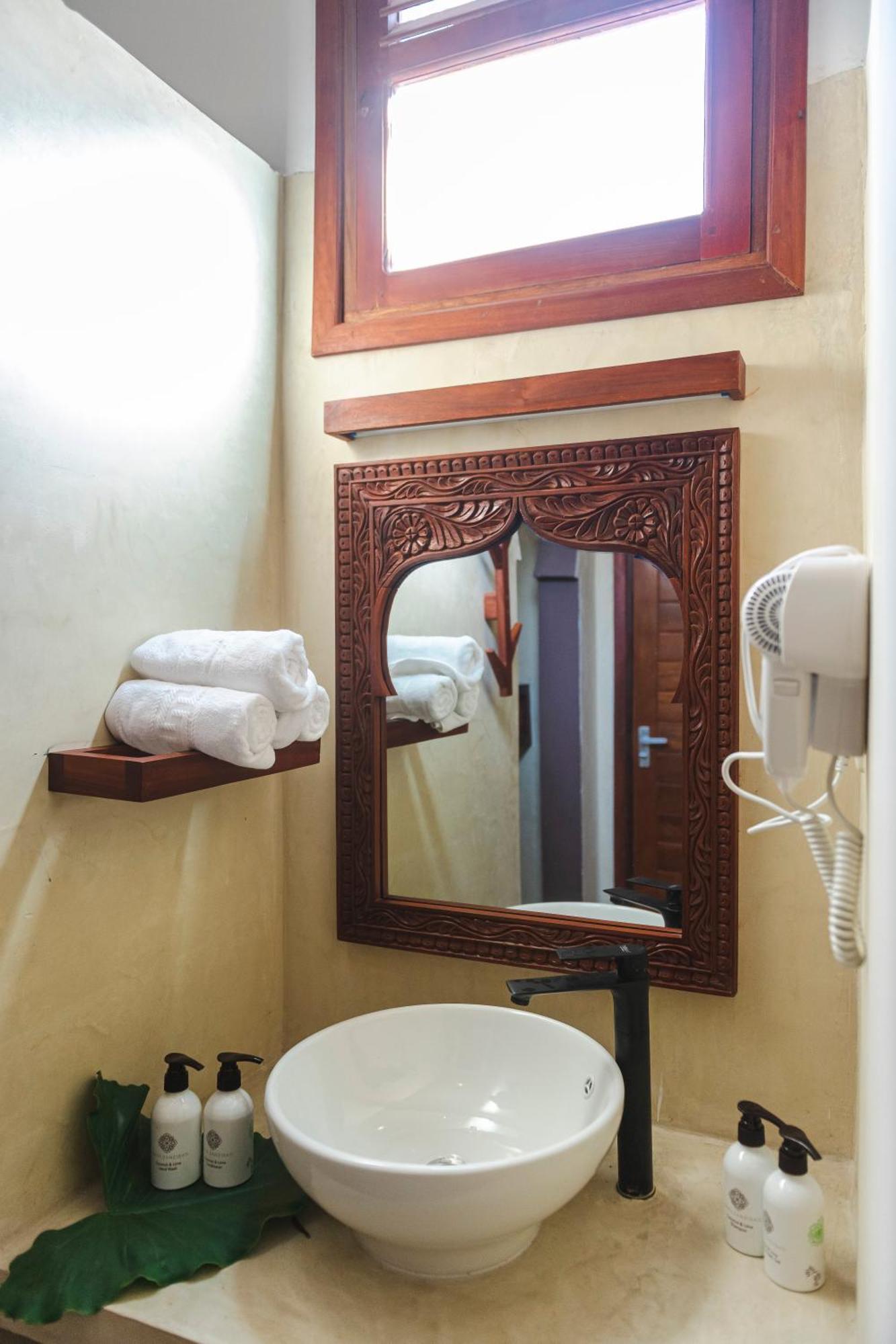 גאמביאני Tasneem Islamic Luxury Suites מראה חיצוני תמונה
