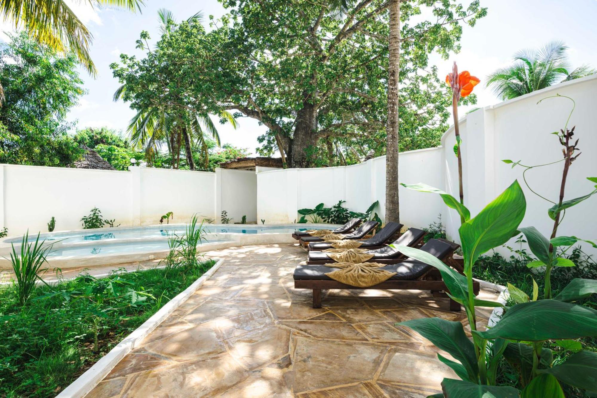 גאמביאני Tasneem Islamic Luxury Suites מראה חיצוני תמונה